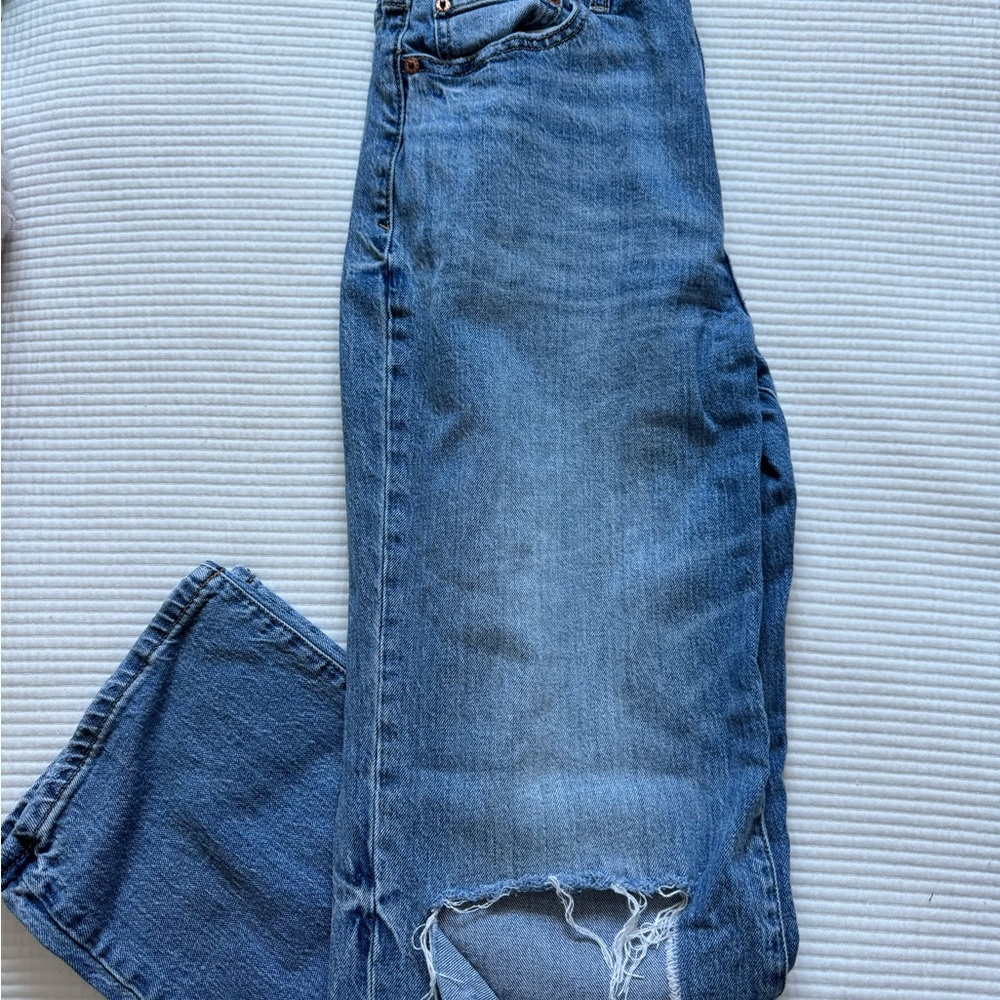 Distressed Blue Denim Jeans